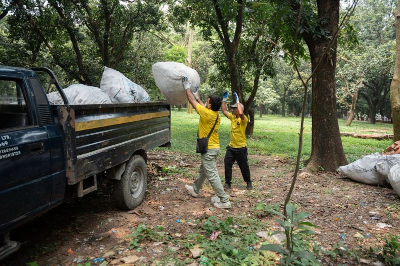 Junk hauling team loading unwanted household items for a Lenexa cleanup